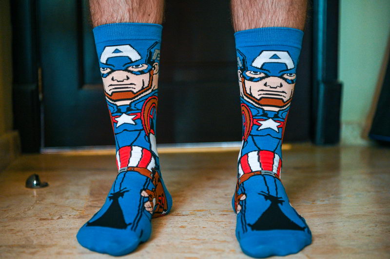Superhero socks groom by Photo Cine Art