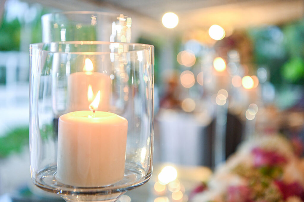 Table for wedding ceremony is decorated with candles