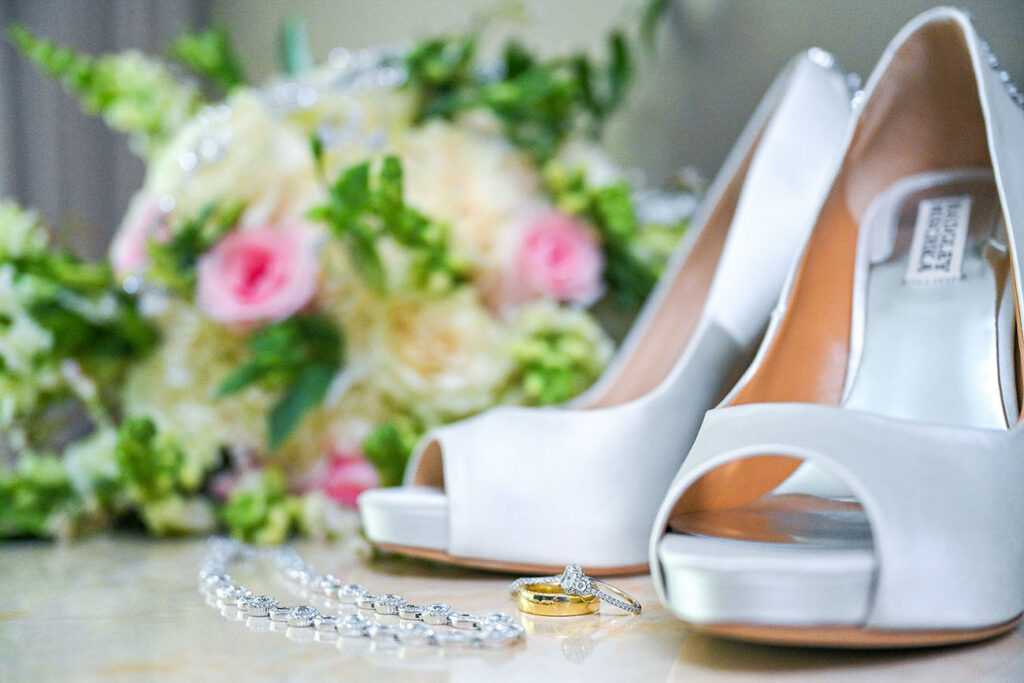 Wedding shoes, necklace, engagement and wedding rings