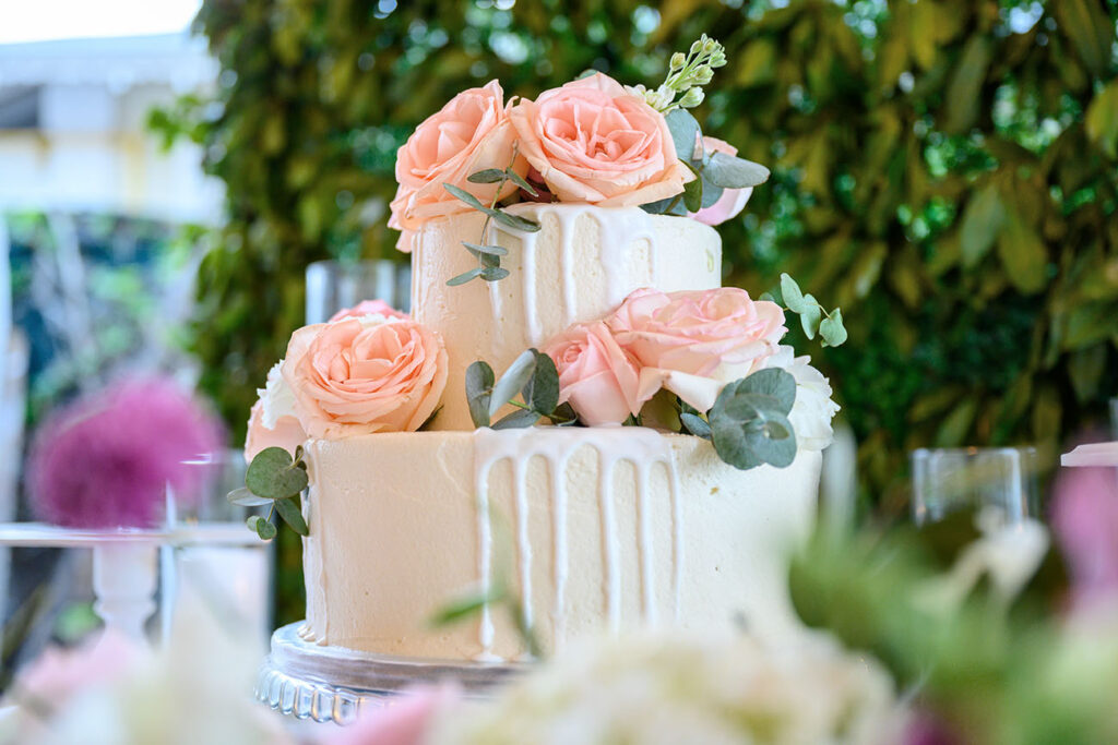 Roses on top of a wedding cake