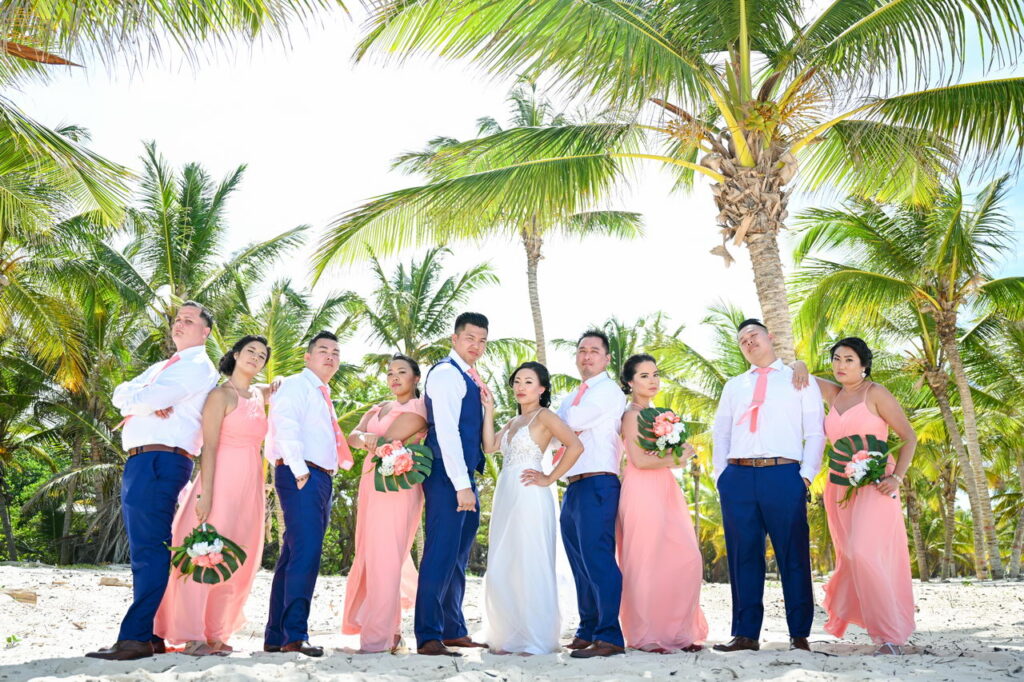 Bridal party at palm tree forest HR Punta Cana wedding photographer