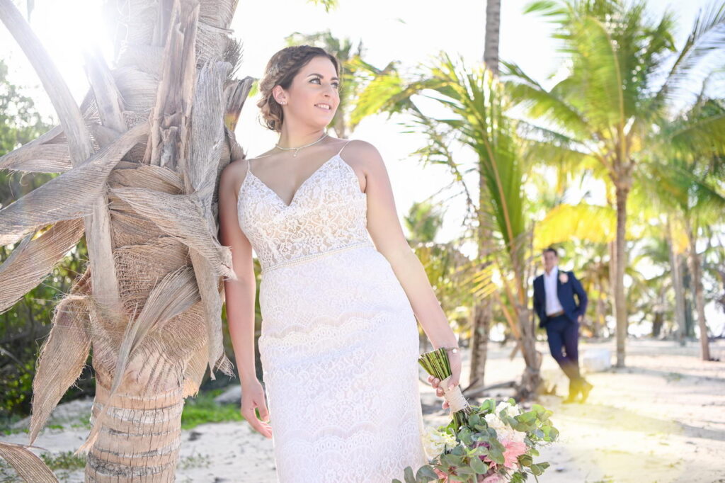 Bride at palm tree forest HR Punta Cana wedding photographer