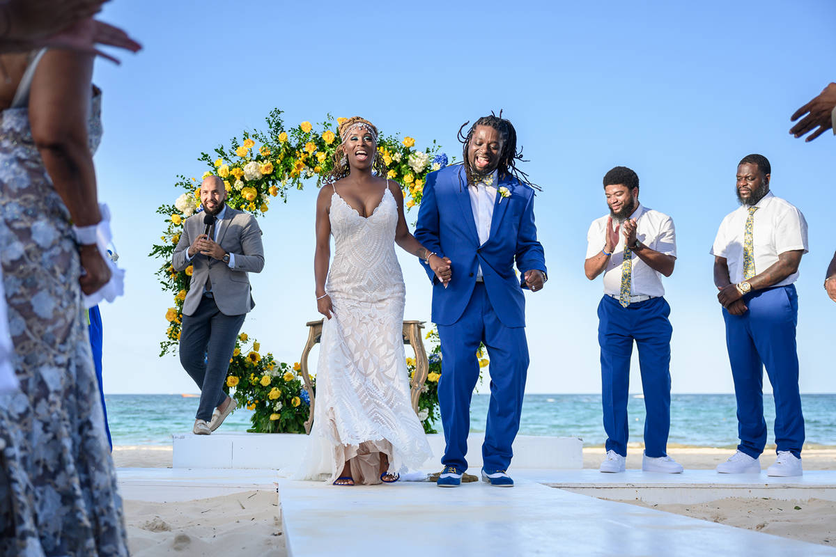 jumping the broom at Kukua ceremony