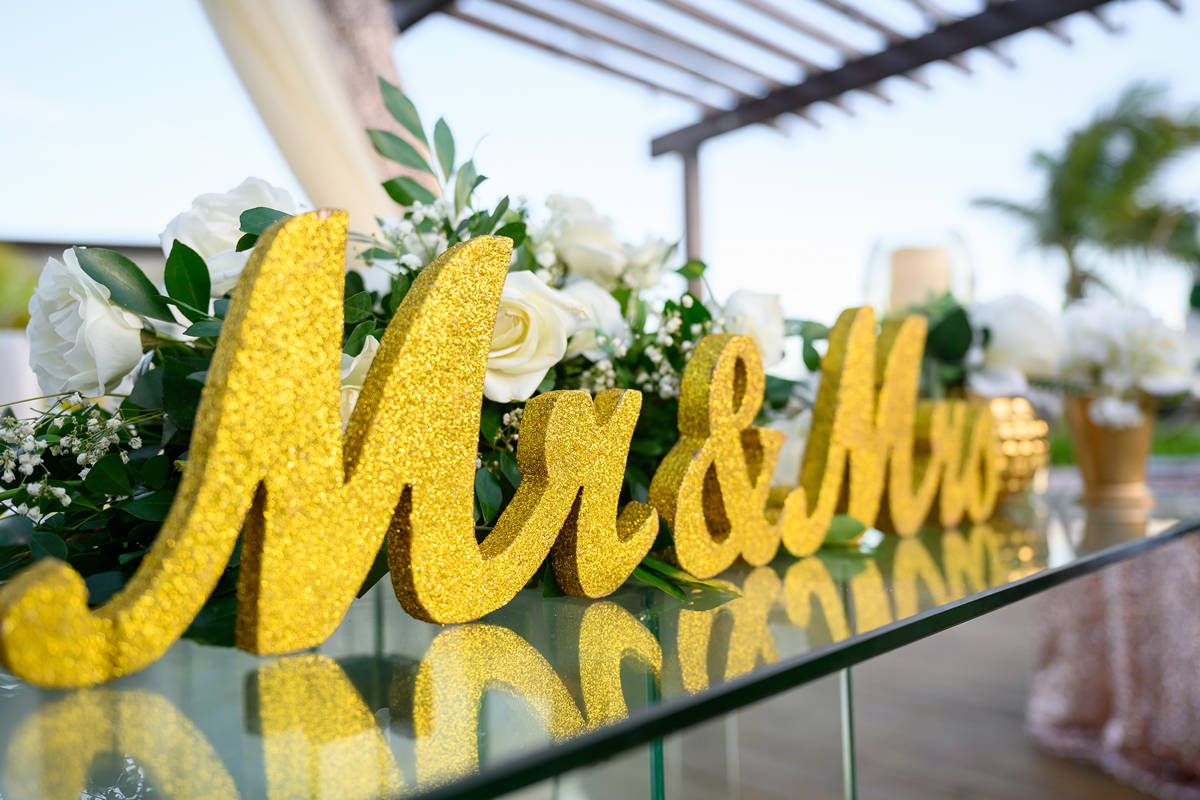 Mr & Mrs sign at Dreams Macao Beach reception by photo cine art