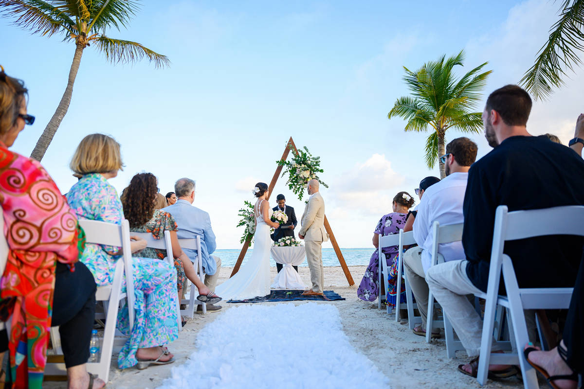 Secrets Resort beach wedding by Photo Cine Art