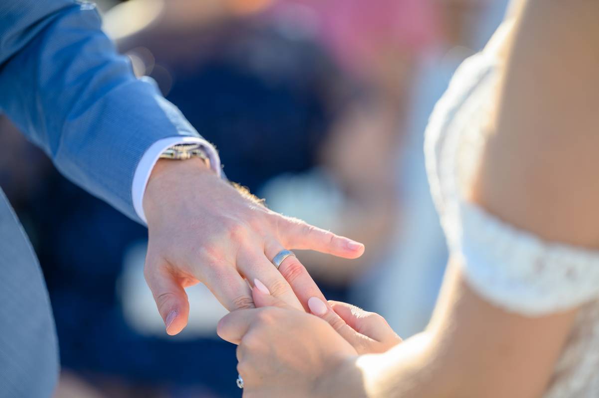 wedding rings exchange by photo cine art
