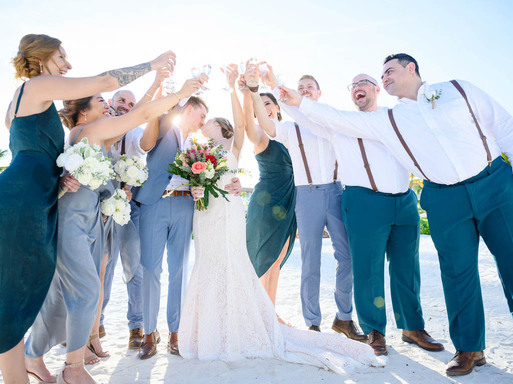 Bridal party toast after wedding ceremony by Photo Cine Art