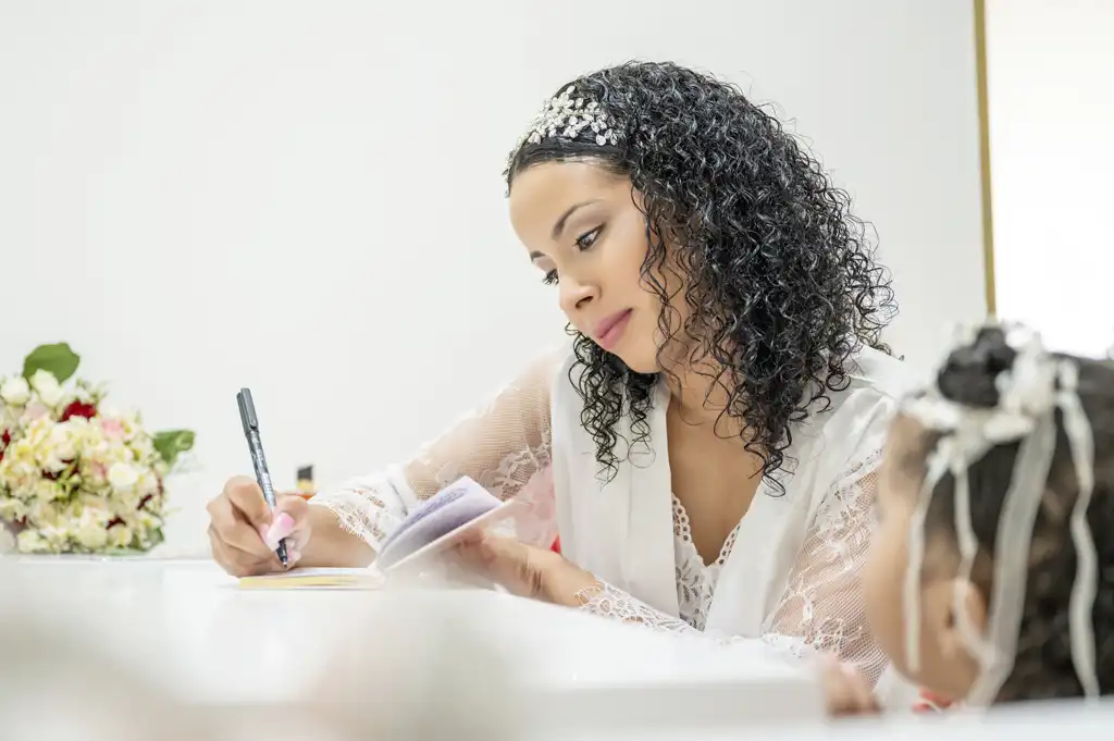 bride writing wedding vows