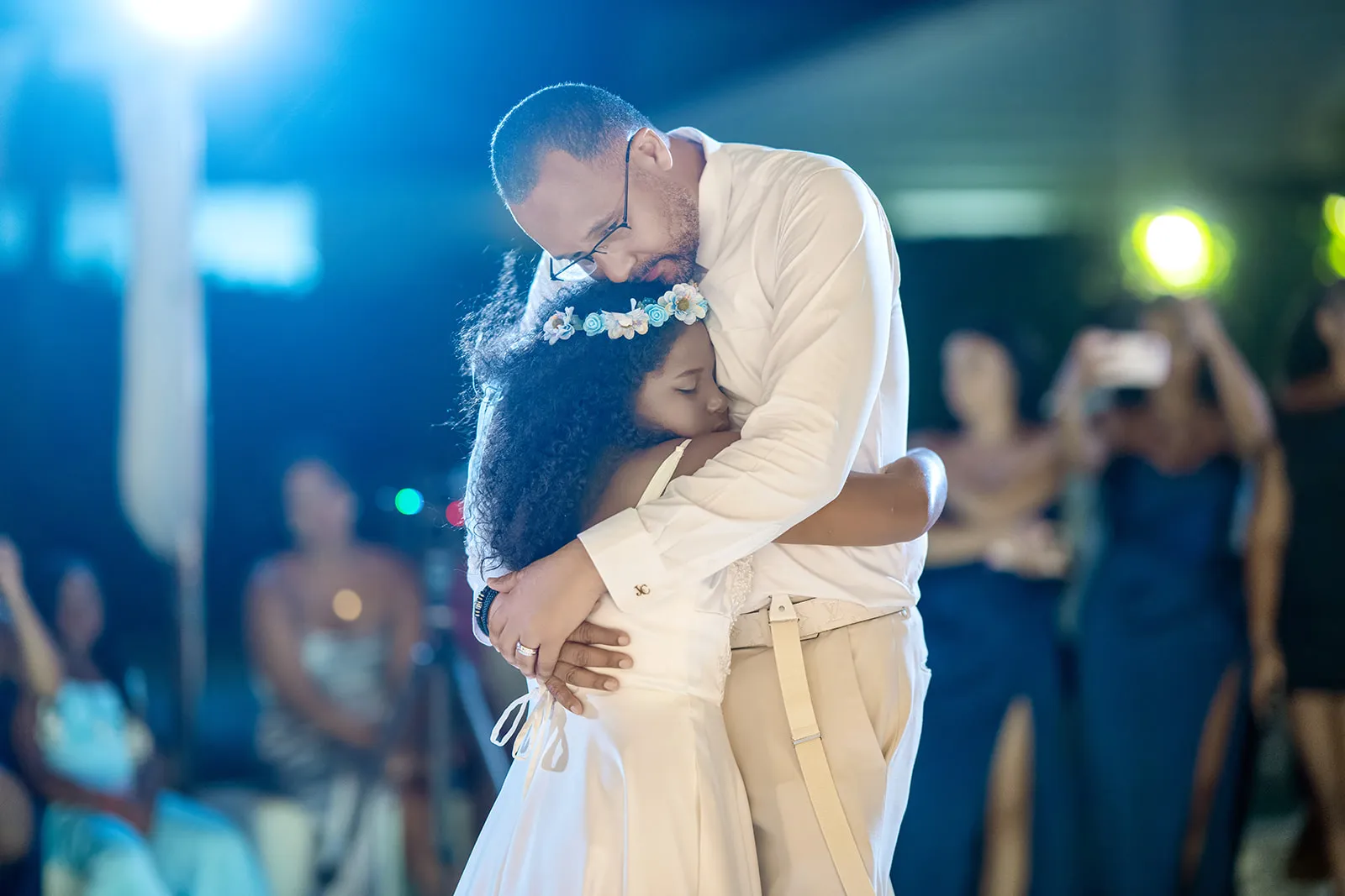 Julio dancing with the flower girl under the lights at the Kukua Beach Club reception Julio dancing with the flower girl under the lights at the Kukua Beach Club reception