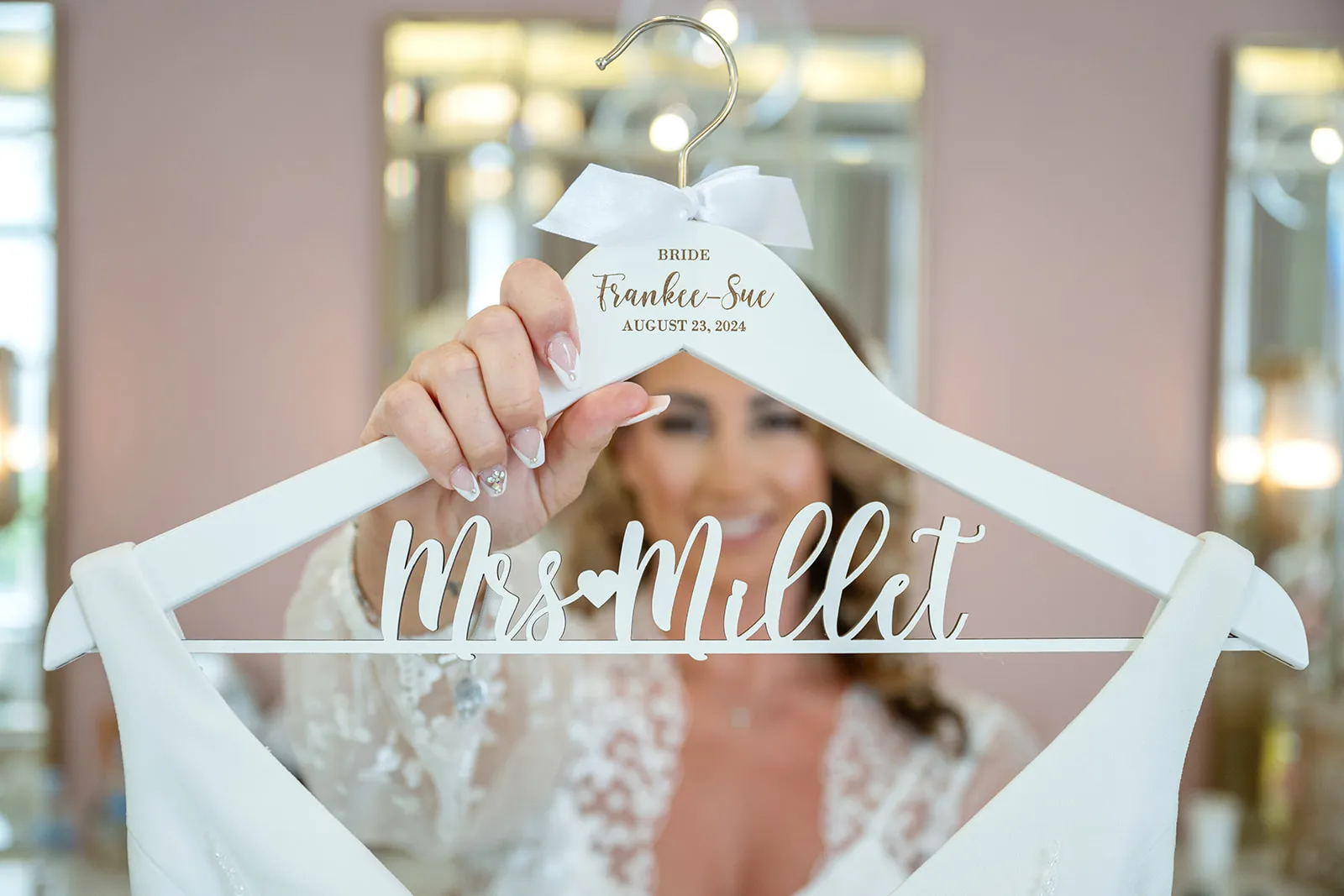 frankeesue-personalized-wedding-dress-hanger Frankeesue holding her personalized Mrs Millet wedding dress hanger before getting dressed
